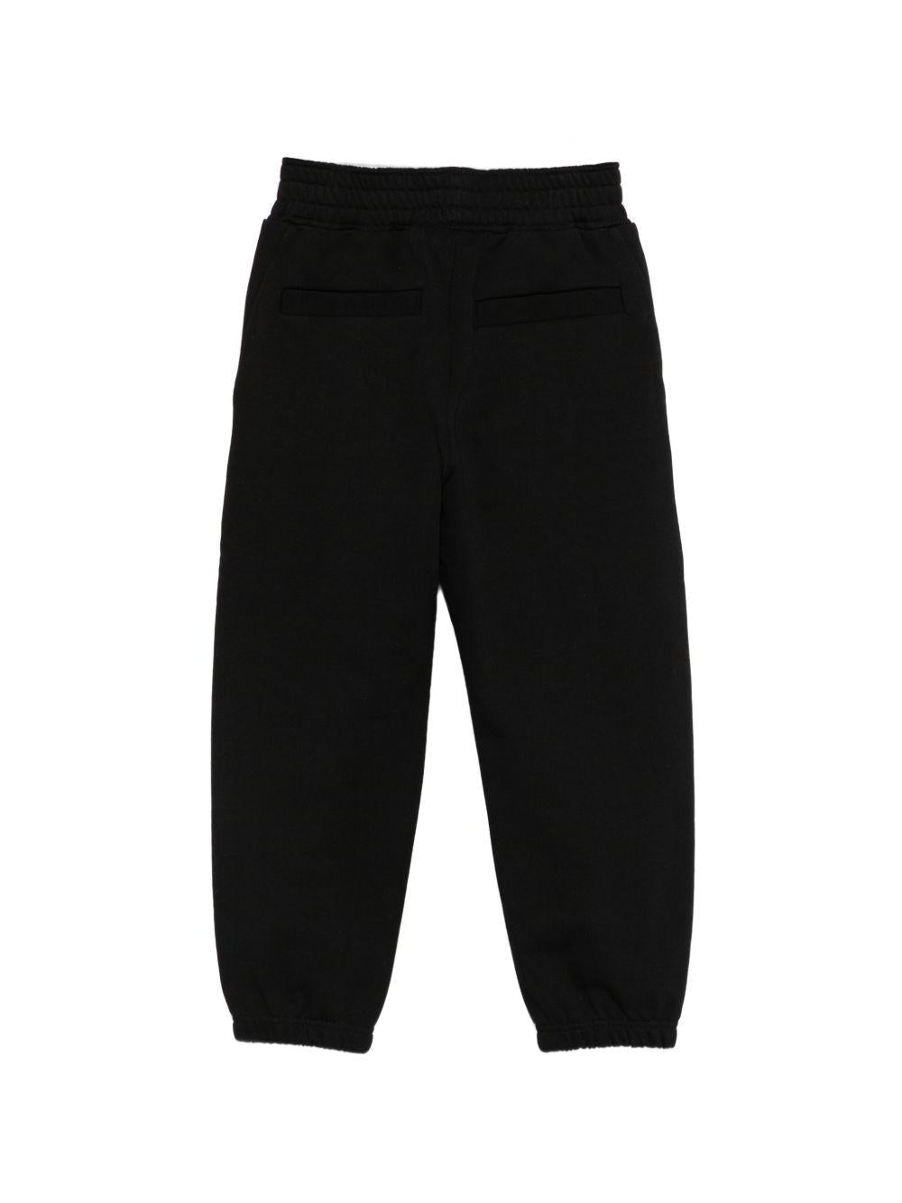 Pantaloni sportivi per bambino Givenchy Kids neri con logo sul davanti - Rubino Kids