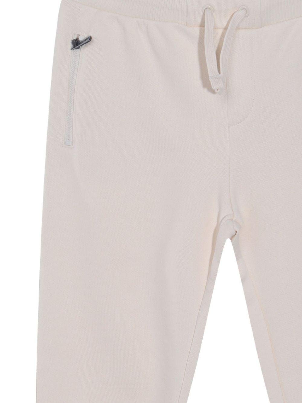 Pantaloni sportivi per bambino Moschino Kids bianco con stampa Teddy Bear - Rubino Kids