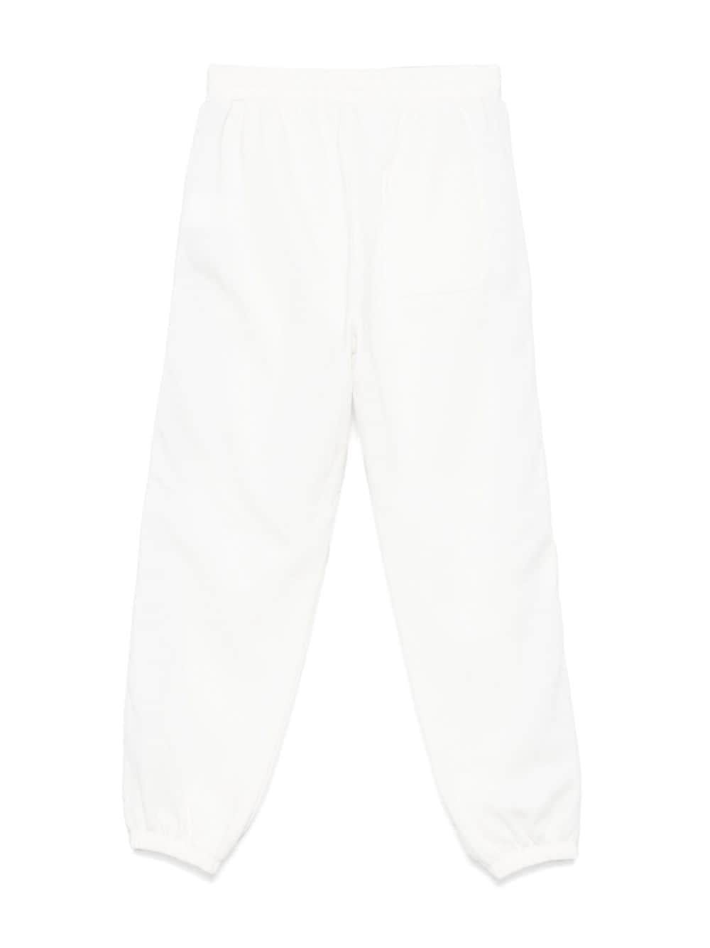 Pantaloni sportivi per bambino Stella McCartney Kids bianco con zip e decorazione sulla manica - Rubino Kids