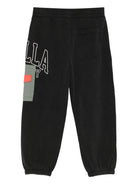 Pantaloni sportivi per bambino Stella McCartney Kids nero con logo applicato - Rubino Kids