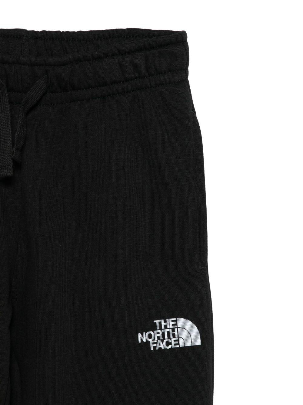 Pantaloni sportivi per bambino The North Face Kids nero con logo ricamato - Rubino Kids