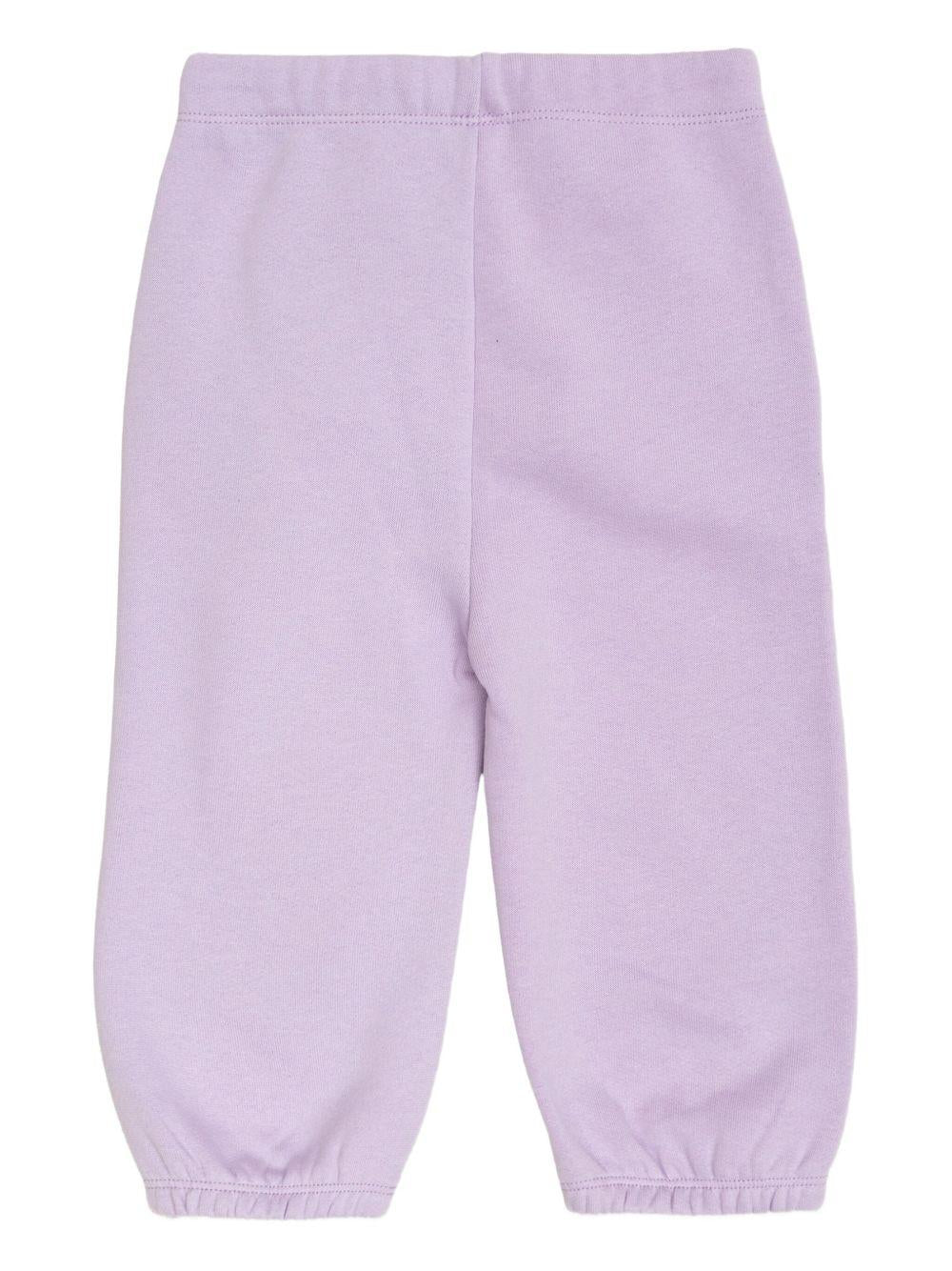 Pantaloni sportivi per neonata Stella McCartney Kids lilla con stampa a cuore - Rubino Kids