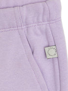 Pantaloni sportivi per neonata Stella McCartney Kids lilla con stampa a cuore - Rubino Kids