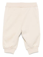 Pantaloni sportivi per neonato Emporio Armani Kids bige con dettagli con logo - Rubino Kids