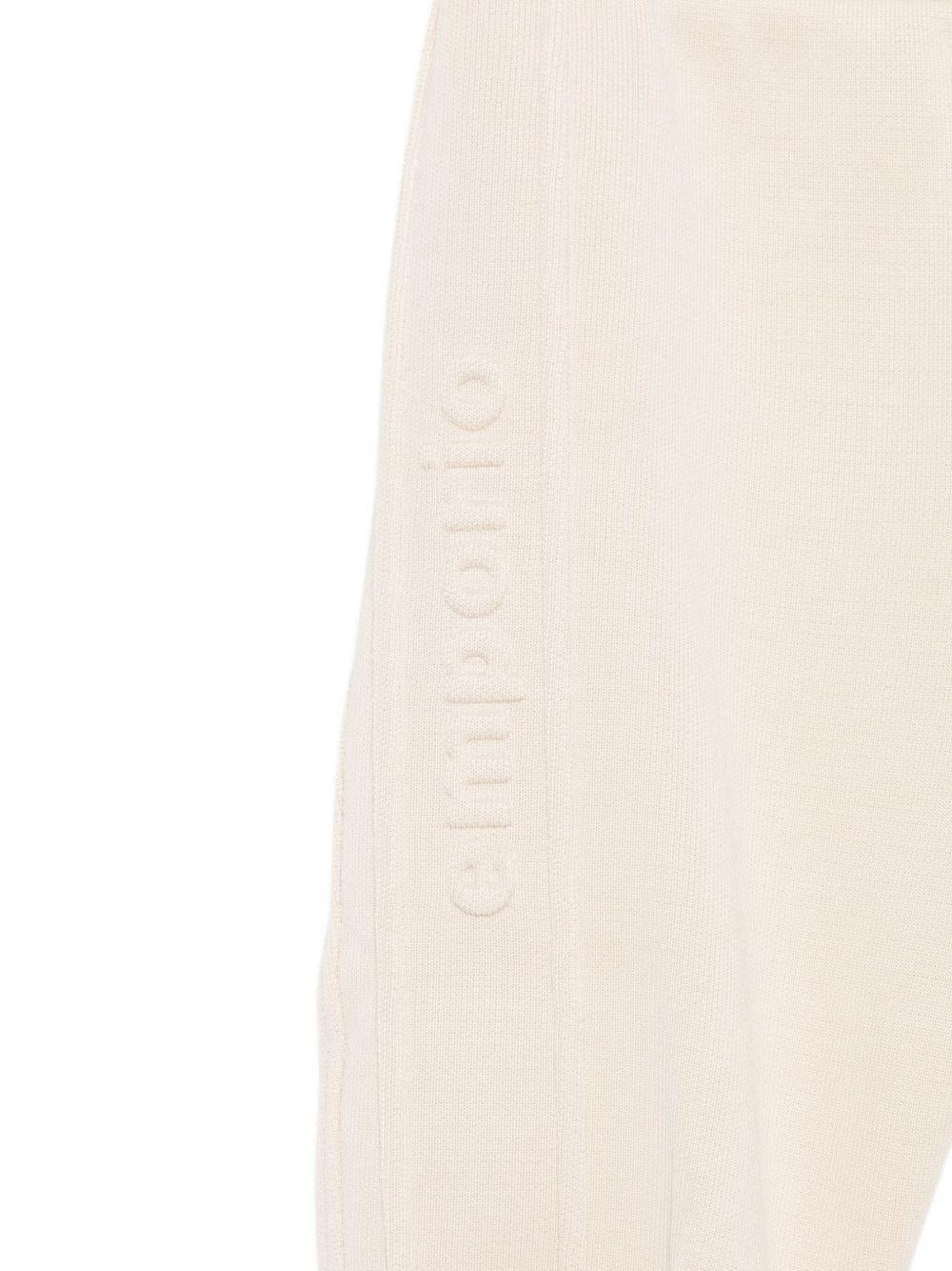 Pantaloni sportivi per neonato Emporio Armani Kids bige con dettagli con logo - Rubino Kids