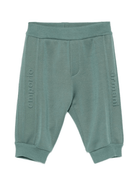 Pantaloni sportivi per neonato Emporio Armani Kids verdi con logo in rilievo - Rubino Kids