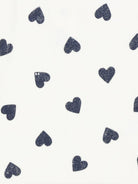 Pigiama per bambina Petit Bateau bianca con stampa a cuore - Rubino Kids