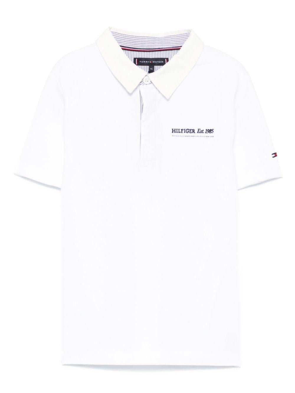 Polo con ricamo per bambino Tommy Hilfiger Junior bianco con spacchi laterali - Rubino Kids