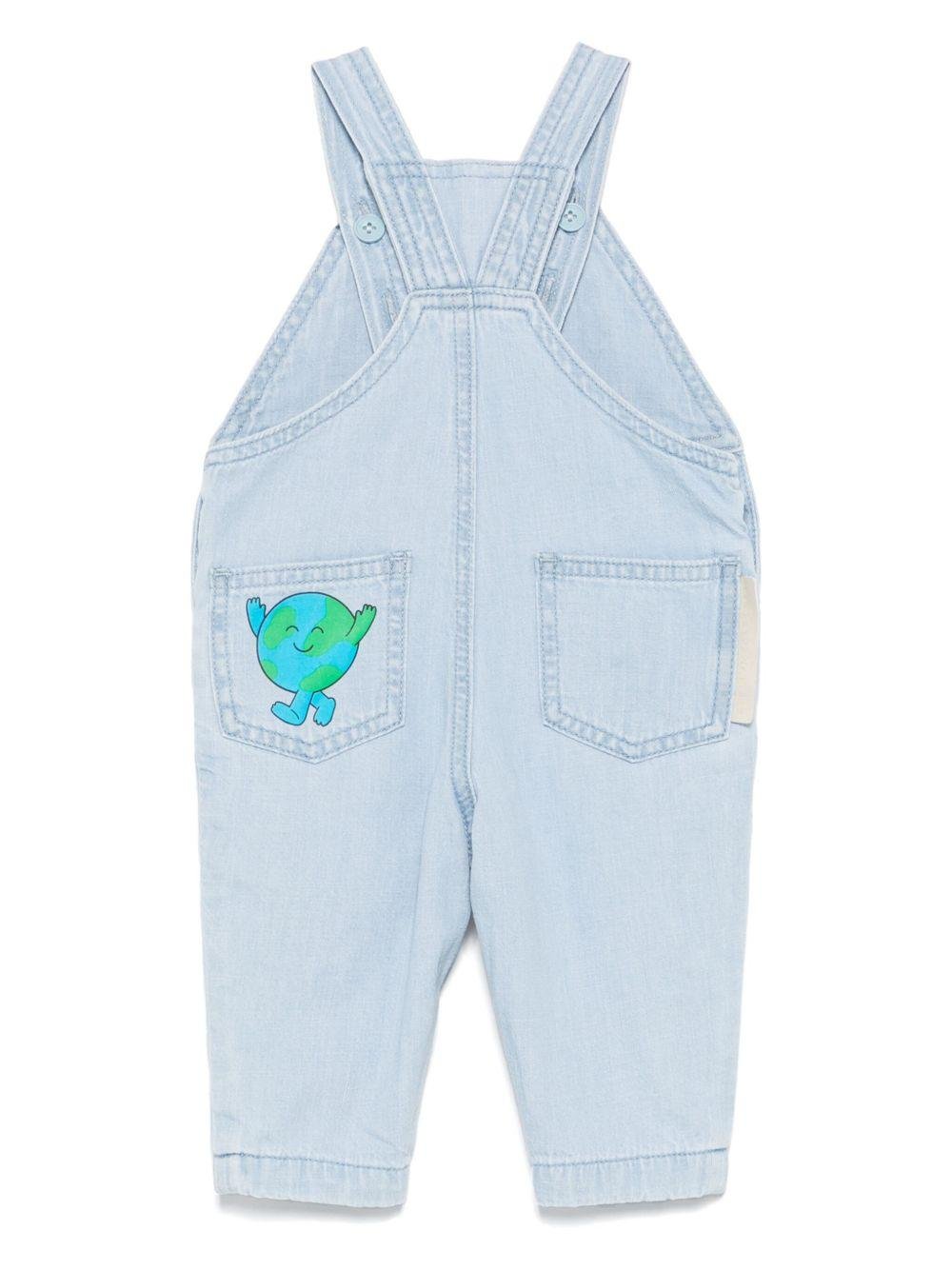 Salopette per neonato Stella McCartney Kids in denim con stampa a motivi - Rubino Kids