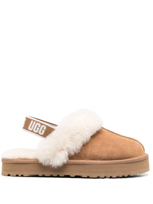 Sandali per bambina UGG Kids foderati di shearling