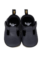 Scarpe Polley primi passi per neonato Dr. Martens Kids nere con cinturino a T - Rubino Kids