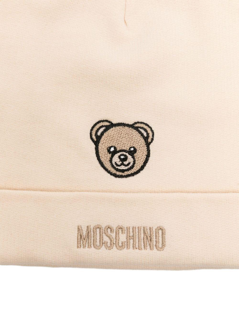 Set bavaglino con cappello per neonati Moschino Kids beige con ricamo di orsacchiotto - Rubino Kids