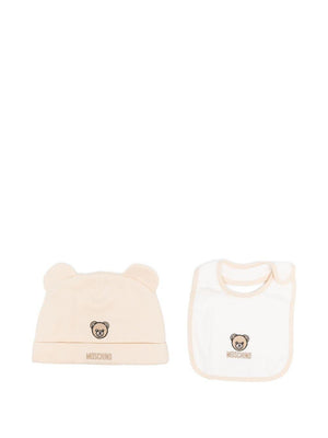Moschino Kids beige baby bib and hat set with teddy bear embroidery