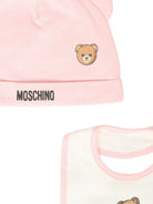 Set berretto e bavaglino per neonata Moschino Kids rosa con motivo Teddy Bear - Rubino Kids