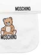 Set berretto e bavaglino per neonati Moschino Kids bianco con motivo Teddy Bear - Rubino Kids