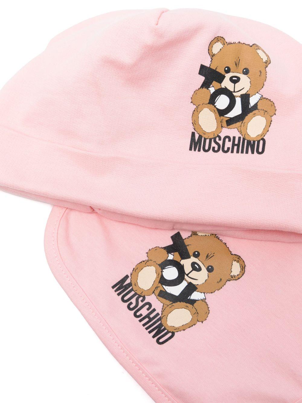 Set cappellino e bavaglino per neonata Moschino Kids rosa con stampa logo e Teddy Bear - Rubino Kids