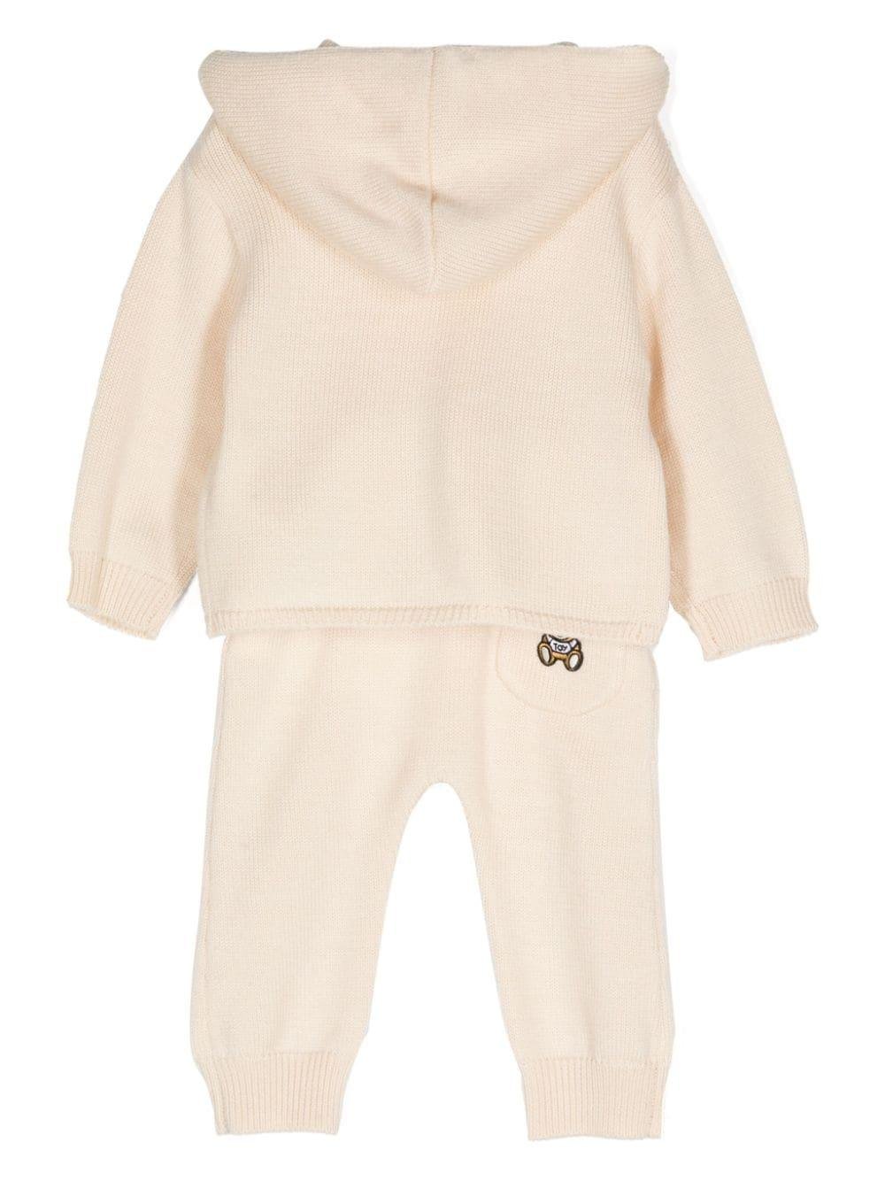 Set cardigan e pantaloni per neonati Moschino Kids beige con design lavorato a maglia - Rubino Kids