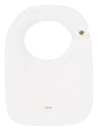 Set tutina e bavaglini per neonata Chloé Kids beige con chiusura con bottone a pressione - Rubino Kids