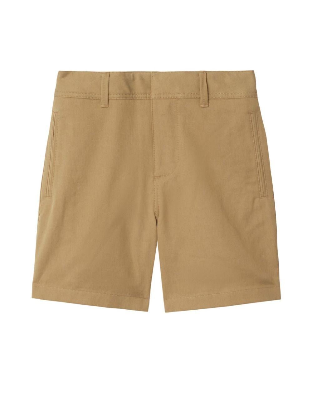 Shorts con spacchi frontali per bambino Burberry Kids beige con due tasche laterali a filetto - Rubino Kids