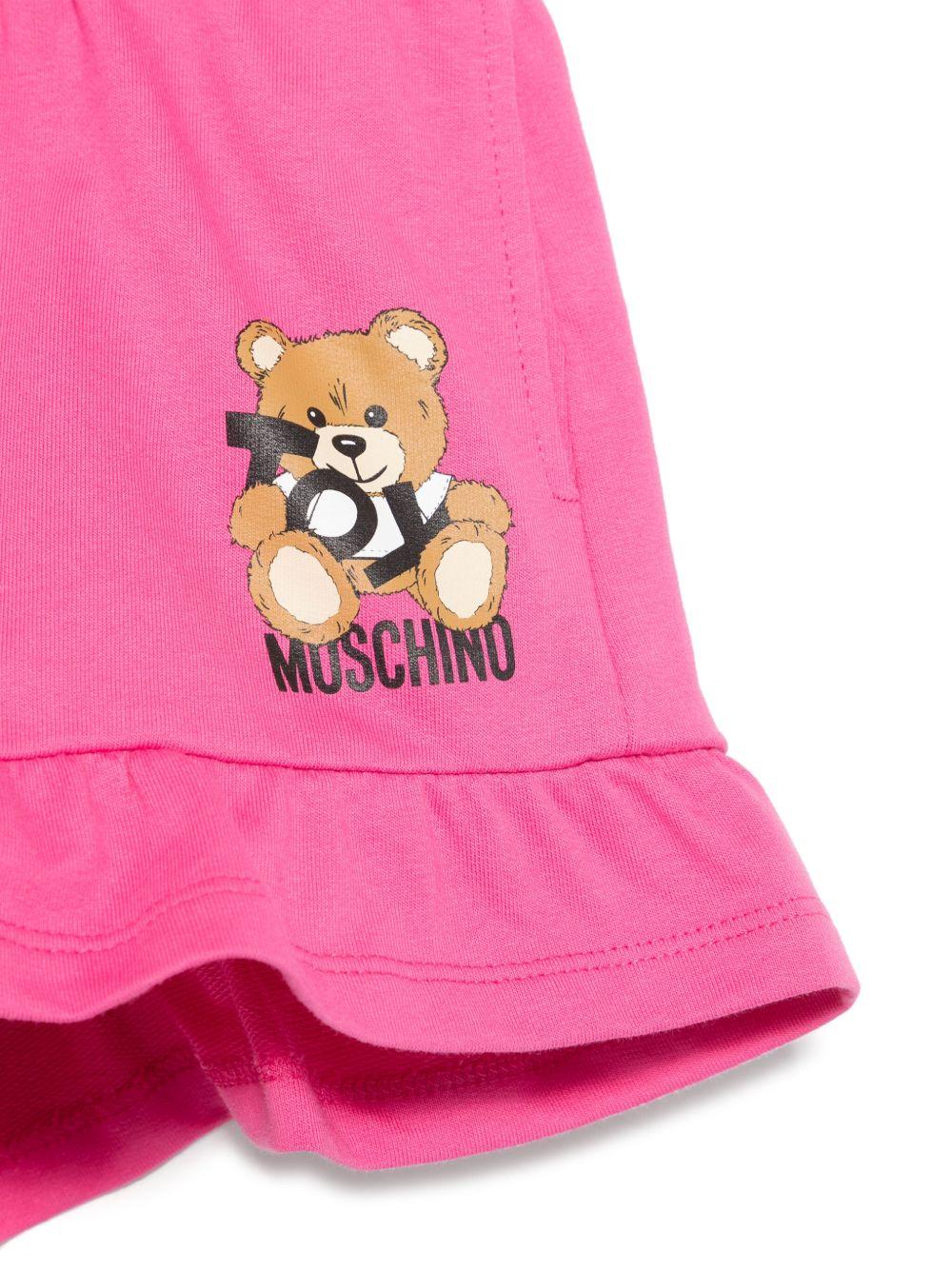 Shorts con stampa Leo Teddy per bambina Moschino Kids fucsia con due tasche laterali - Rubino Kids