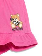 Shorts con stampa Leo Teddy per bambina Moschino Kids fucsia con due tasche laterali - Rubino Kids