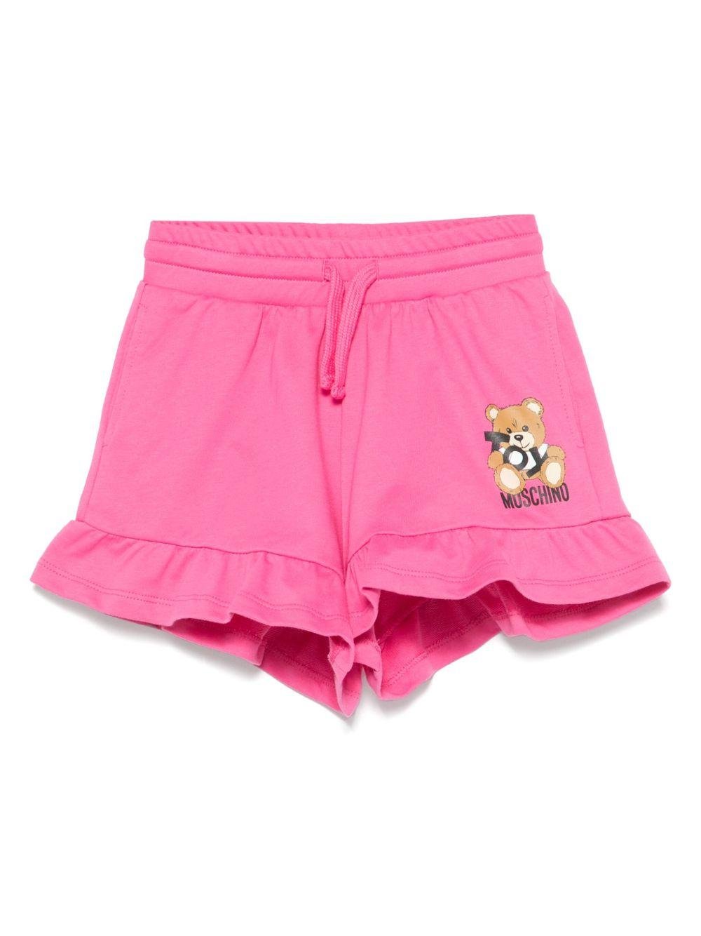 Shorts con stampa Leo Teddy per bambina Moschino Kids fucsia con due tasche laterali - Rubino Kids