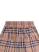 Shorts per bambina Burberry Kids beige con motivo Vintage Check all - over - Rubino Kids
