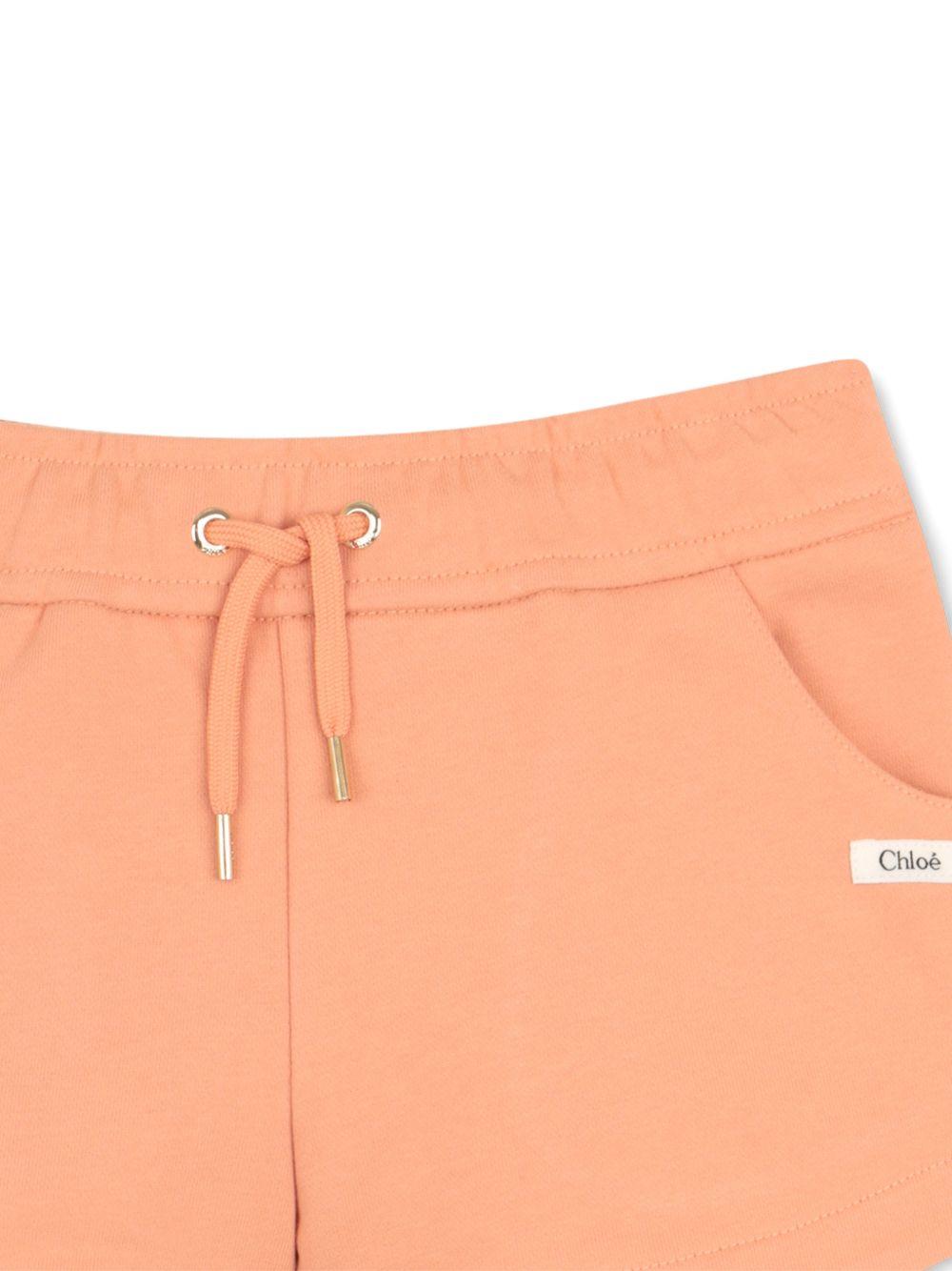 Shorts per bambina Chloé Kids arancione con coulisse - Rubino Kids