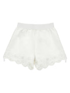 Shorts per bambina Monnalisa bianchi con ricamo a fiori - Rubino Kids