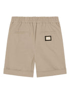 Shorts per bambino Dolce & Gabbana Kids beige con logo posteriore - Rubino Kids