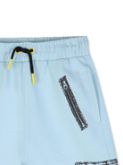 Shorts per bambino The Marc Jacobs azzurro con stampa grafica - Rubino Kids