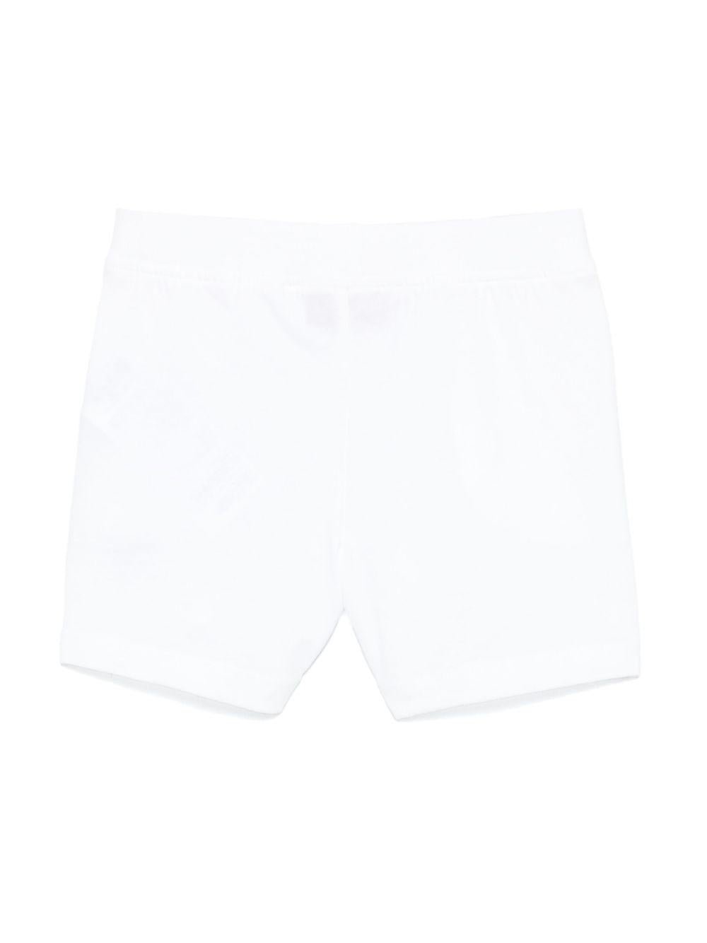 Shorts per neonato Moschino Kids bianco con stampa logo con vita elasticizzata - Rubino Kids