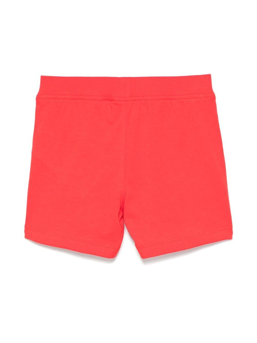 Shorts per neonato Moschino Kids rosso con stampa logo con vita elasticizzata - Rubino Kids