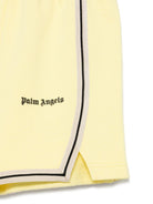 Shorts sportivi con stampa per bambino Palm Angels Kids giallo con spacchetti laterali - Rubino Kids