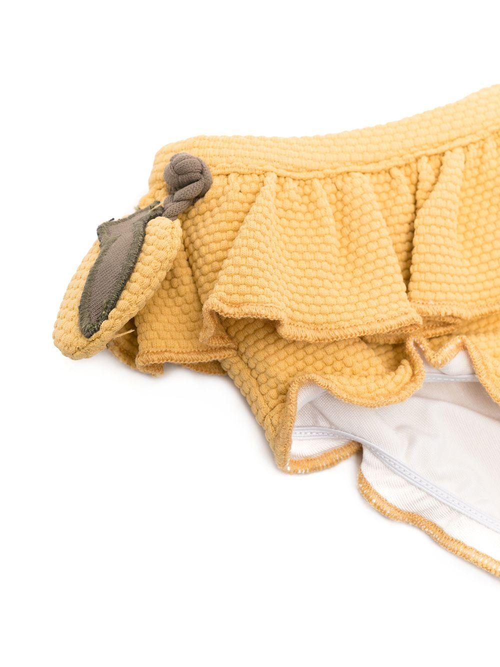 Slip bikini per neonata Donsje giallo con ruches - Rubino Kids