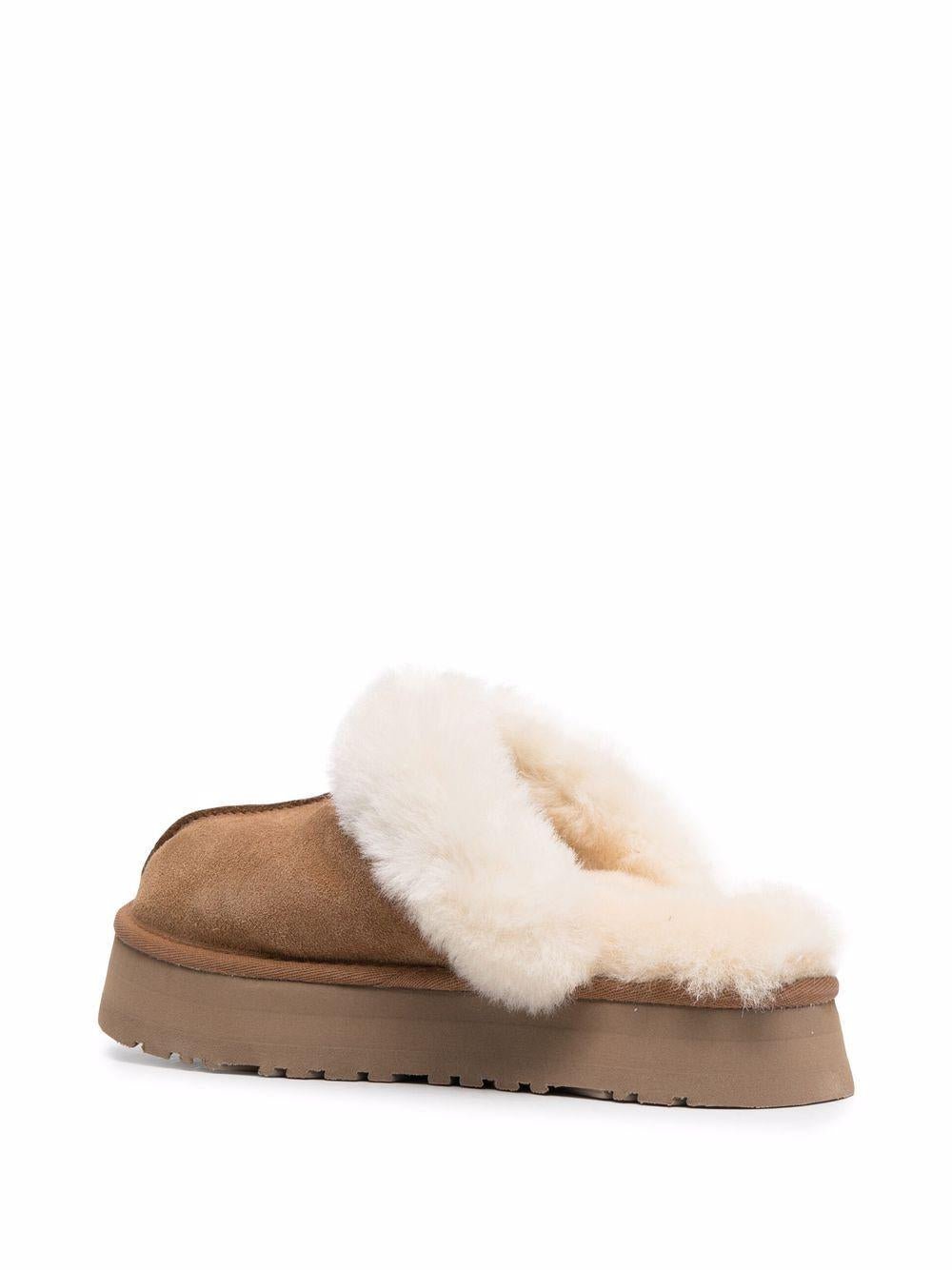 Slippers per bambina UGG Kids Disquette marrone con finitura in pelliccia sintetica - Rubino Kids
