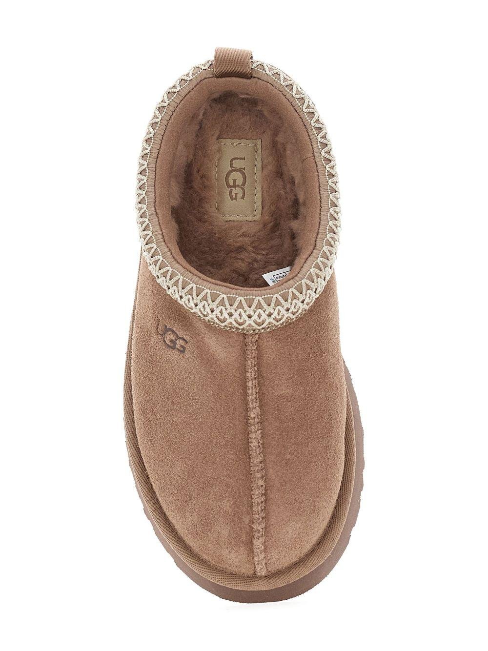 Slippers Tazz per bambini UGG Kids beige con rifiniture intrecciate - Rubino Kids