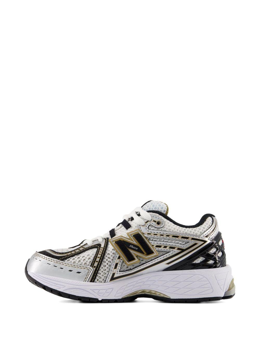 Sneakers 1906 per bambino New Balance Kids grigie con applicazione logo sui lati - Rubino Kids
