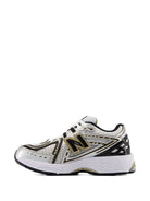 Sneakers 1906 per bambino New Balance Kids grigie con applicazione logo sui lati - Rubino Kids