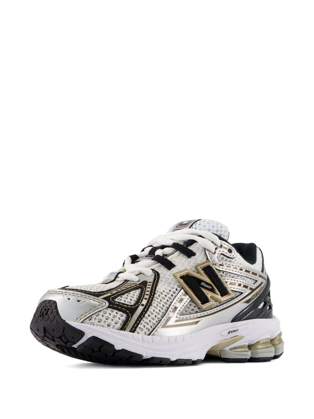 Sneakers 1906 per bambino New Balance Kids grigie con applicazione logo sui lati - Rubino Kids