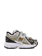 Sneakers 1906 per bambino New Balance Kids grigie con inserti a contrasto - Rubino Kids