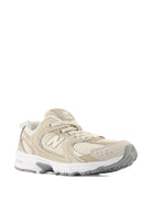 Sneakers 530 per bambini New Balance Kids beige con logo sulla linguetta - Rubino Kids