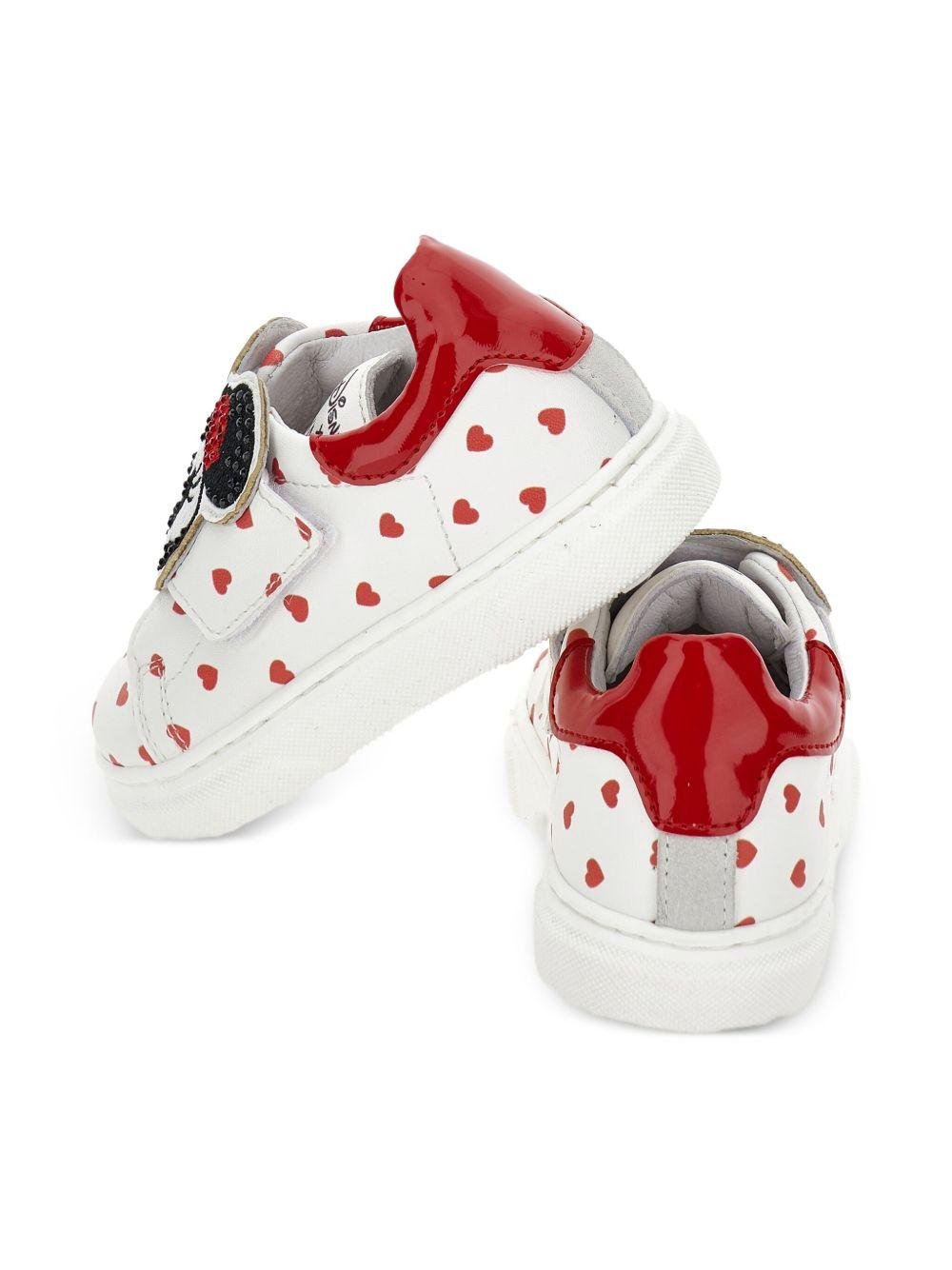 Sneakers per bambina Monnalisa bianche con motivo a cuori rossi - Rubino Kids