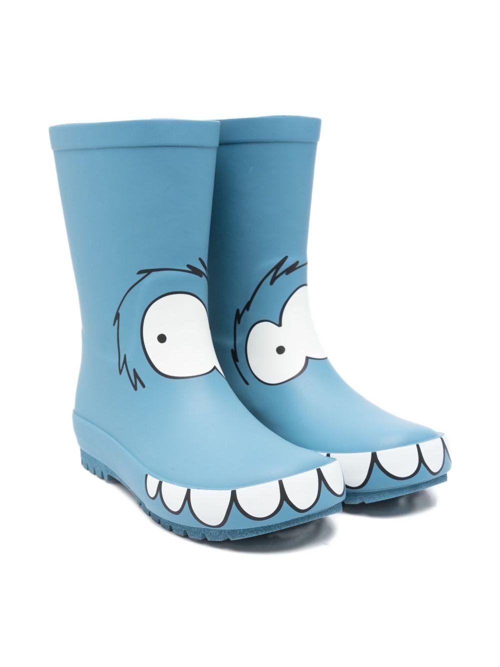 Stivali da pioggia per bambino Stella McCartney Kids azzurro con texture a forma di faccia di mostro - Rubino Kids
