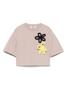 T-shirt crop per bambina MSGM Kids beige mandorla con applicazione a fiori - Rubino Kids