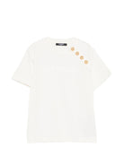 T-shirt per bambina Balmain Kids bianca con bottoni color oro sul davanti - Rubino Kids