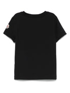 T-shirt per bambina Moncler Enfant nera con logo in rilievo e toppa sulla manica - Rubino Kids