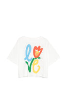T-shirt per bambina Stella McCartney Kids bianca con stampa Love - Rubino Kids