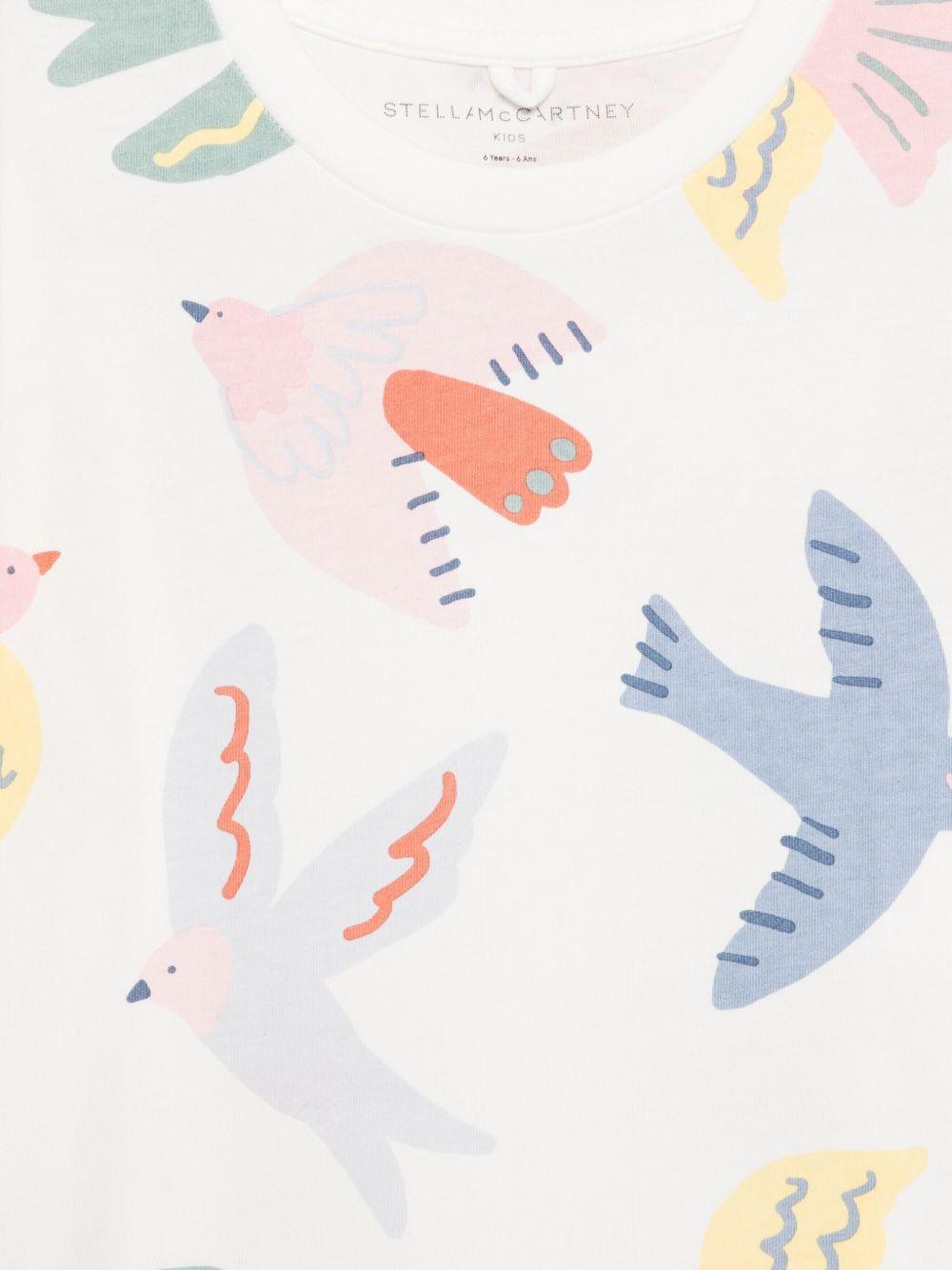 T-shirt per bambina Stella McCartney Kids bianco con stampa grafica - Rubino Kids