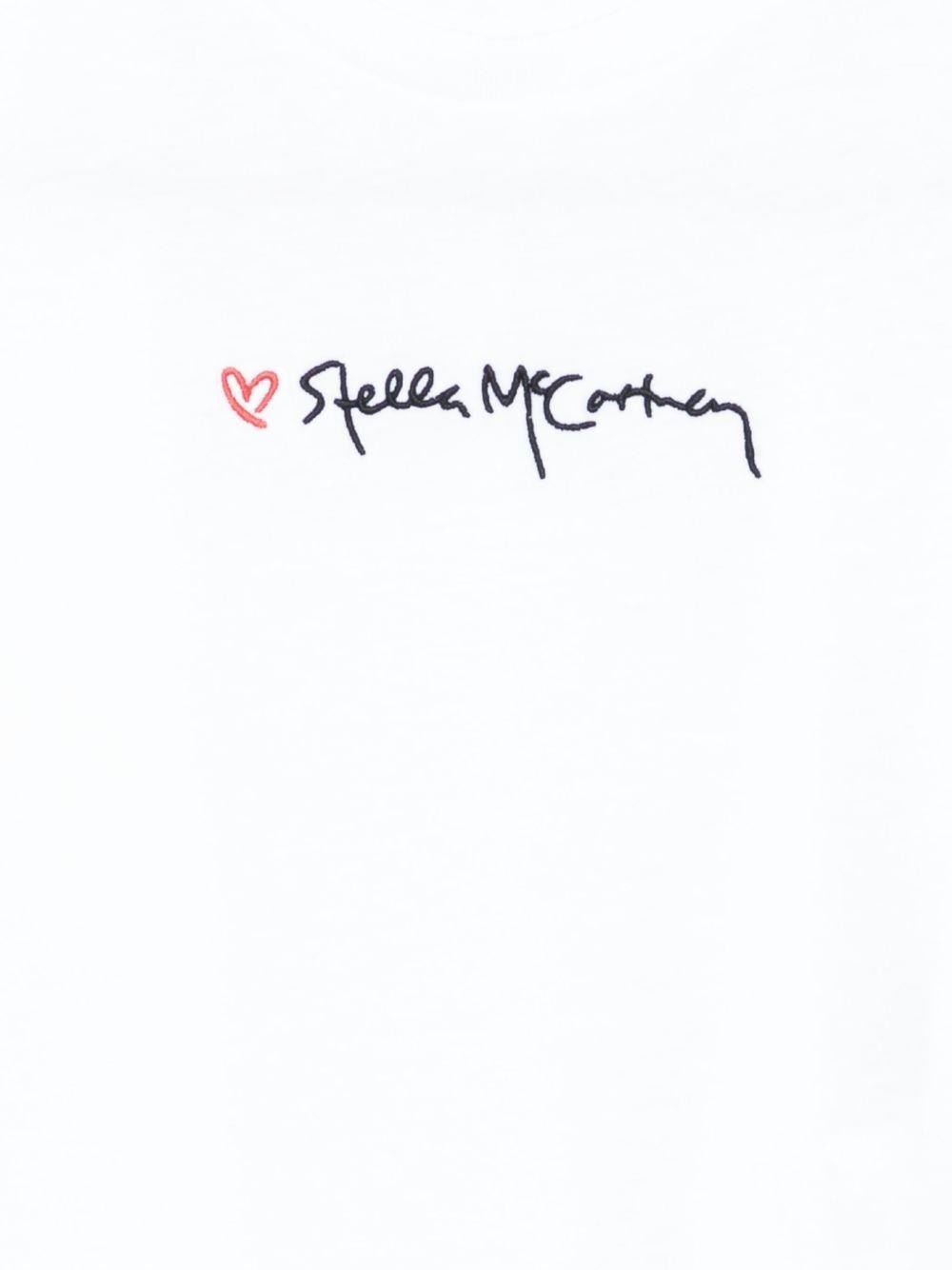 T-shirt per bambina Stella McCartney Kids bianco in cotone con logo ricamato - Rubino Kids
